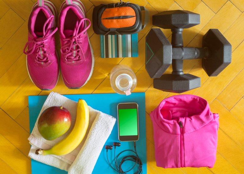 items for workout or exercise placed on the wooden floor